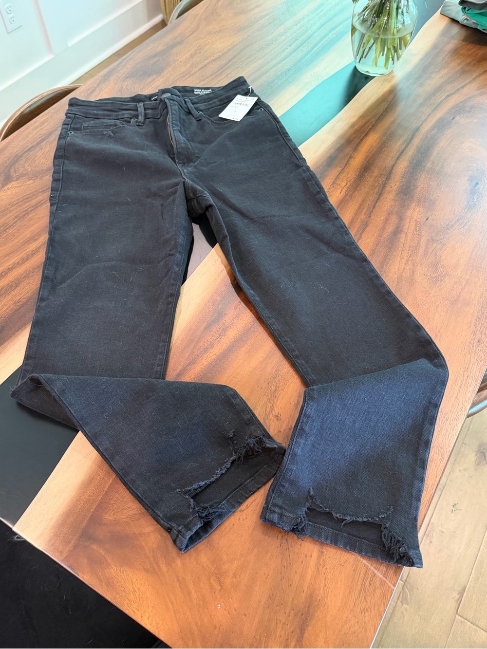 Good American Black Flare Jeans with Raw Hem